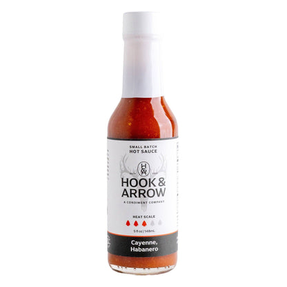 Hook & Arrow Cayenne Habanero hot sauce bottle on a white background