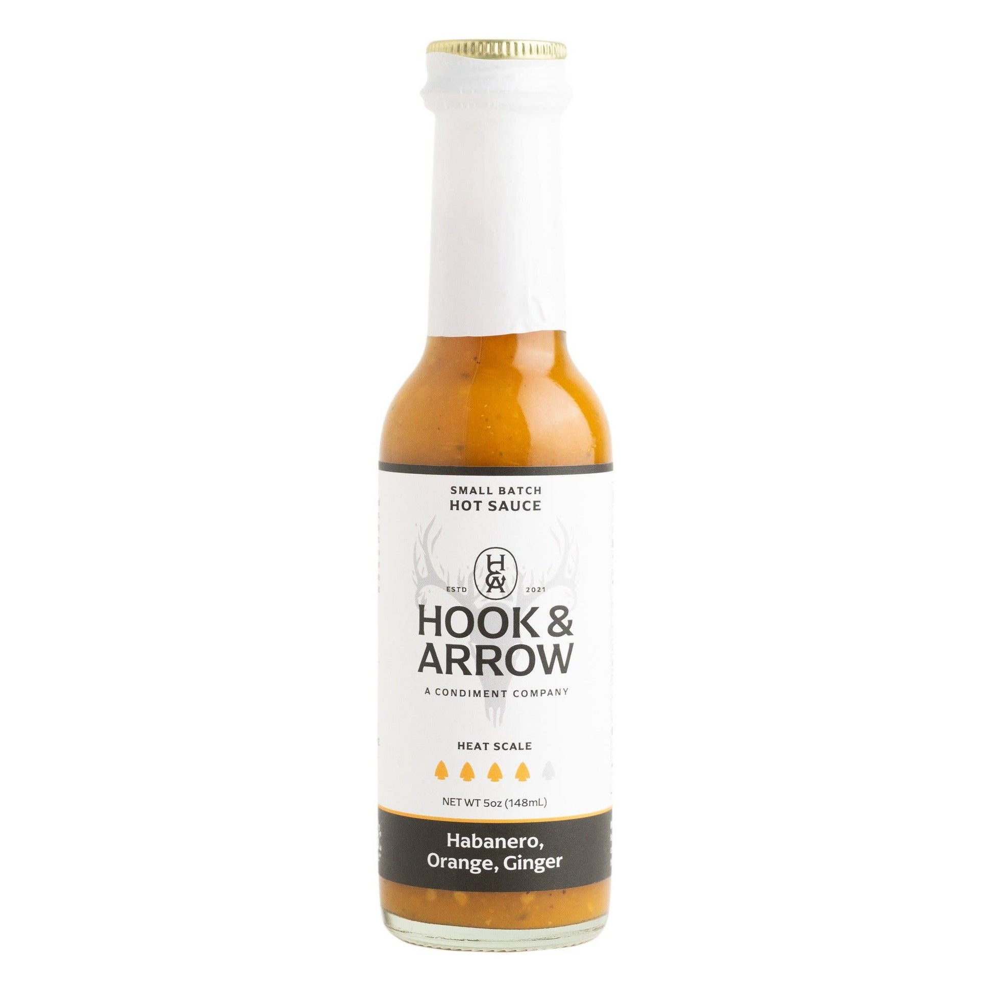Hook & Arrow hot sauce bottle on a white background