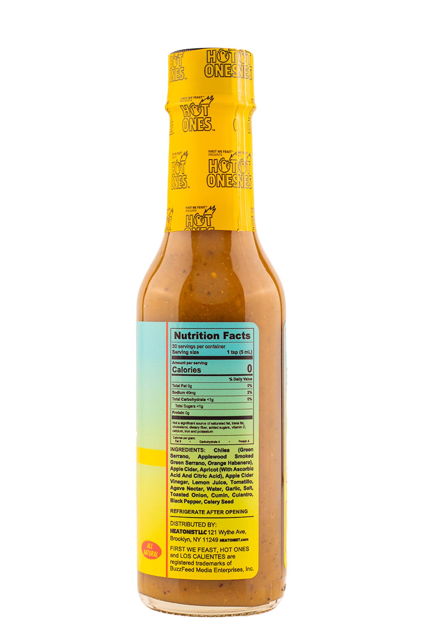 Los Calientes Verde Hot sauce bottle with yellow label on a white background