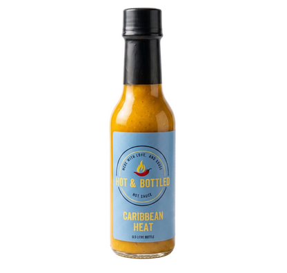 Bottle of 'Hot & Bottled' Caribbean Heat hot sauce on a white background