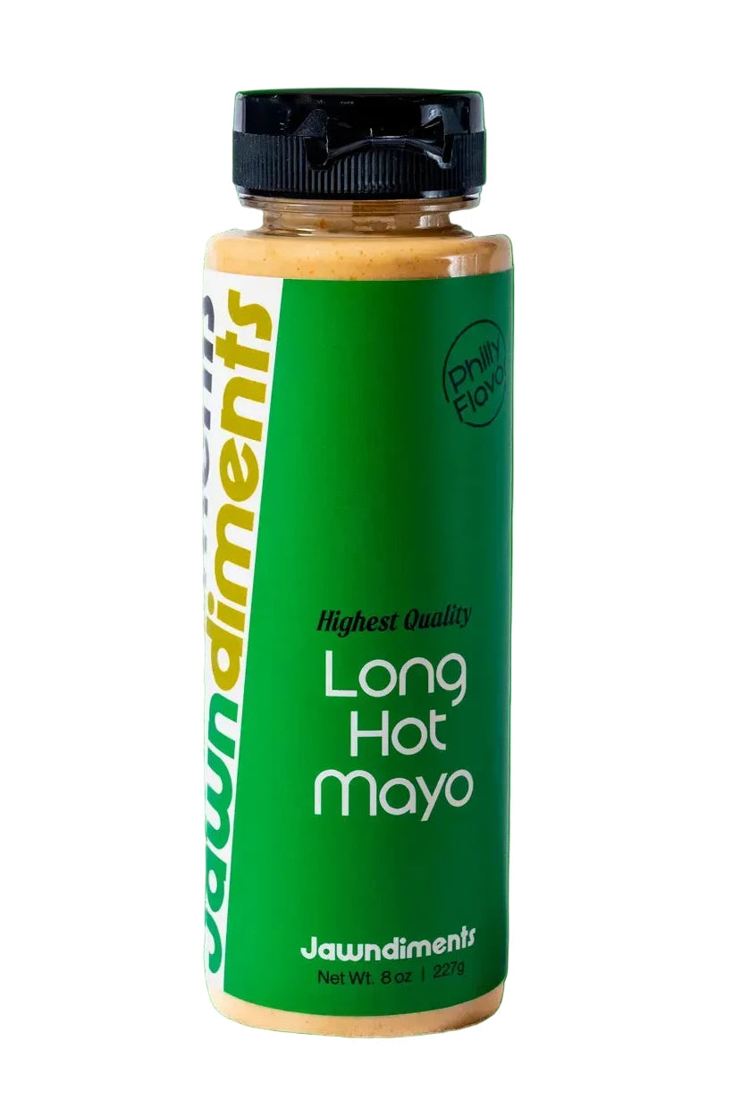 Green bottle of 'Long Hot Mayo' with black cap on a white background