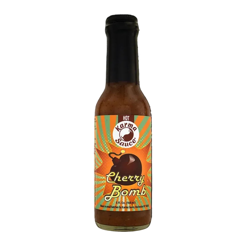 Hot sauce bottle labeled 'Cherry Bomb' with a colorful label on a white background