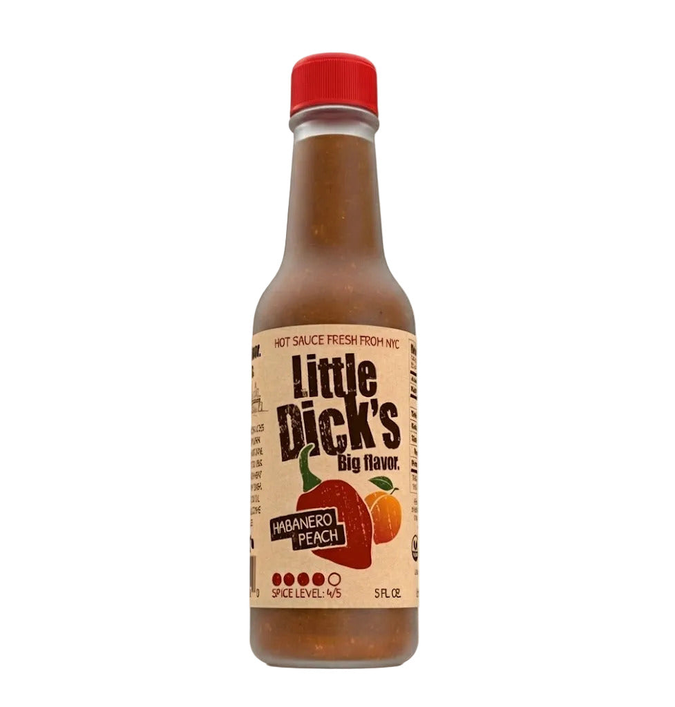 Bottle of Little Dick's hot sauce with a red cap on a white background