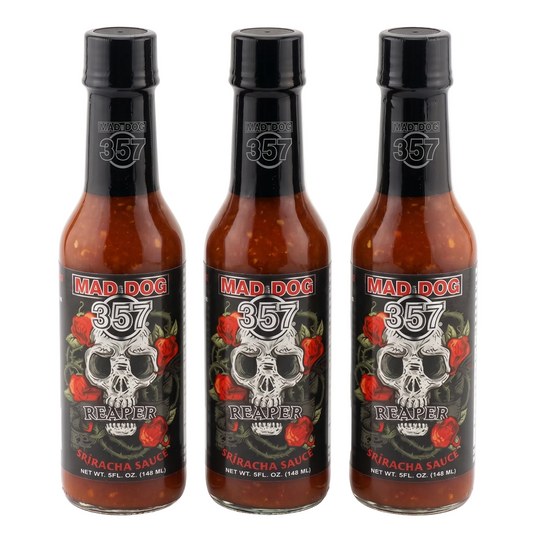 Three bottles of Mad Dog 357 Reaper Sriracha Sauce on a white background