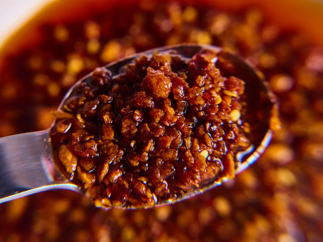 Close-up of a spoonful of chili crisp