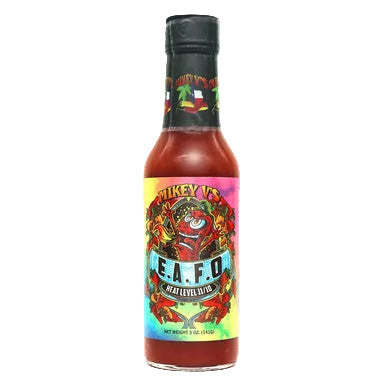 Hot sauce bottle with colorful label on a white background
