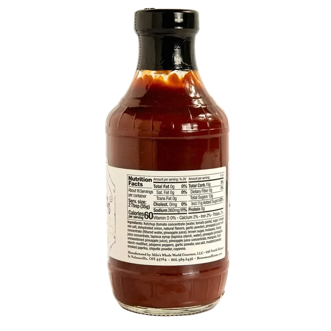Bottle of barbecue sauce with a nutrition label on a white background