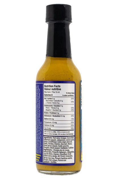Bottle of hot sauce with nutrition label on a white background