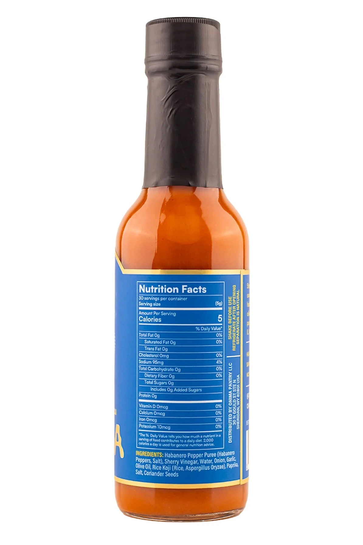 Hot sauce bottle with nutrition facts label on a white background