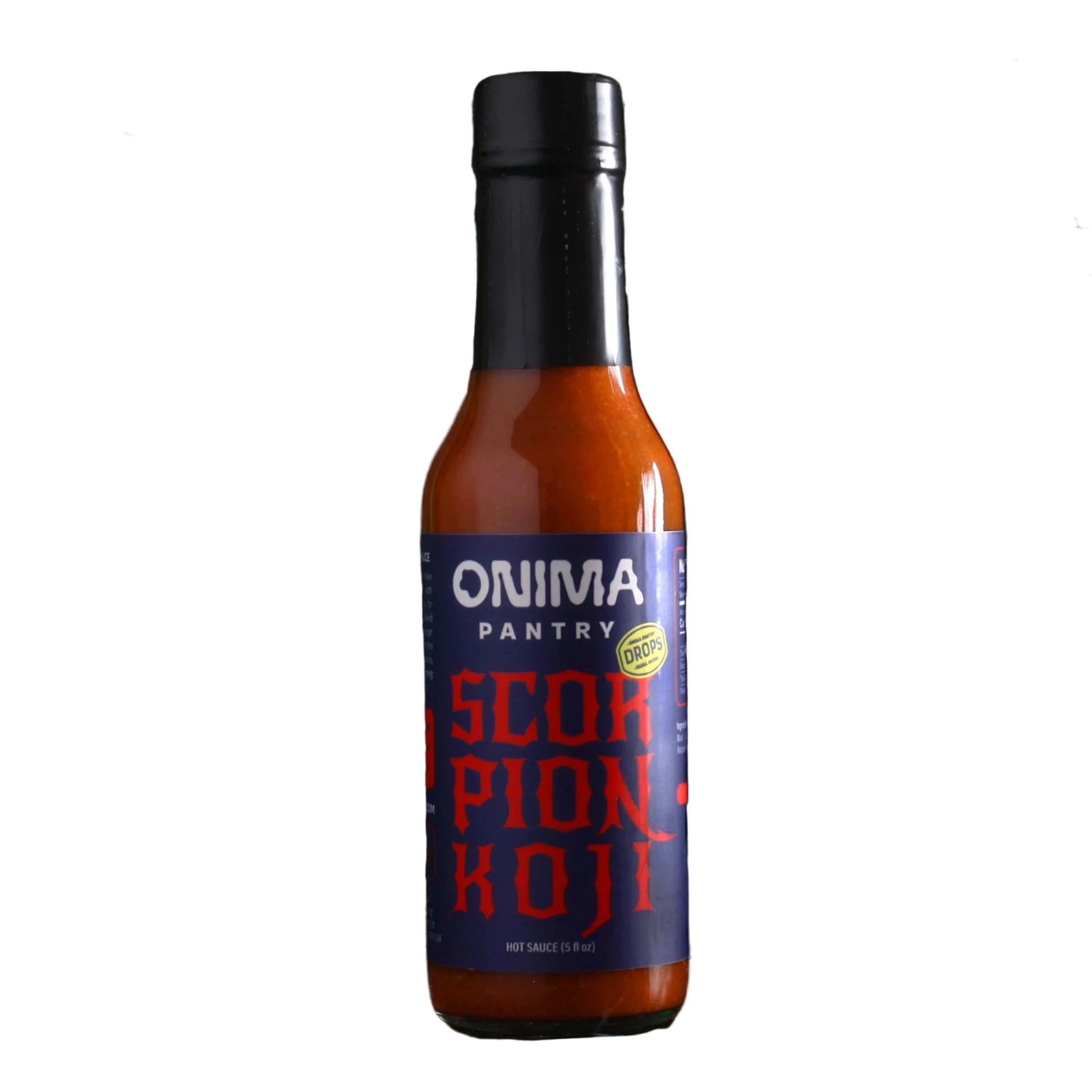Bottle of Onima Pantry Scorpion Koji hot sauce on a dark background