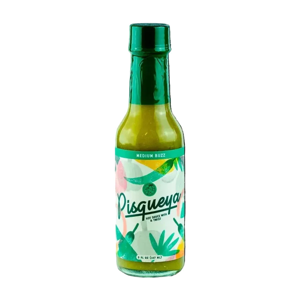 Pisqueya hot sauce bottle with green cap and colorful label on a white background