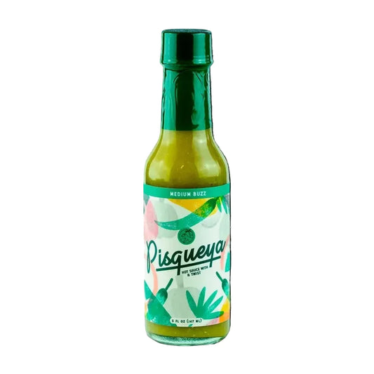 Pisqueya hot sauce bottle with green cap and colorful label on a white background