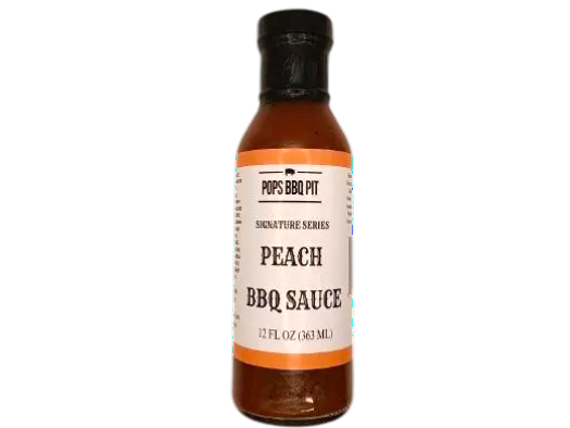 Bottle of Peach BBQ Sauce with a white label on a white background