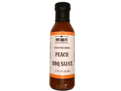 Bottle of Peach BBQ Sauce with a white label on a white background