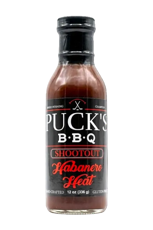 Bottle of Puck's BBQ Sauce on a white background