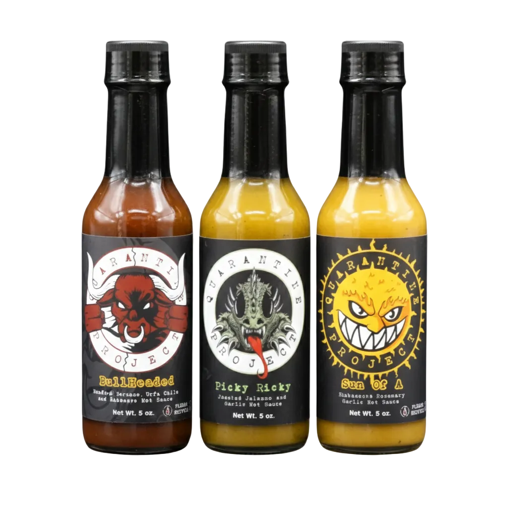 Three Quarantine Project hot sauce bottles with distinct labels on a white background