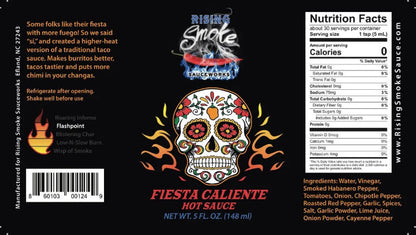 Label of Rising Smoke Sauce Works Fiesta Caliente Hot Sauce with nutritional facts and ingredients listed.