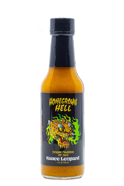 A bottle of Sauce Leopard 'Homegrown Hell' Sichuan Tamarind Hot Sauce on a plain white background.