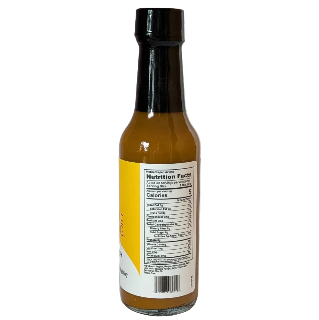 Bottle of Scoville Warming Original Recipe hot sauce with nutrition facts label on a white background