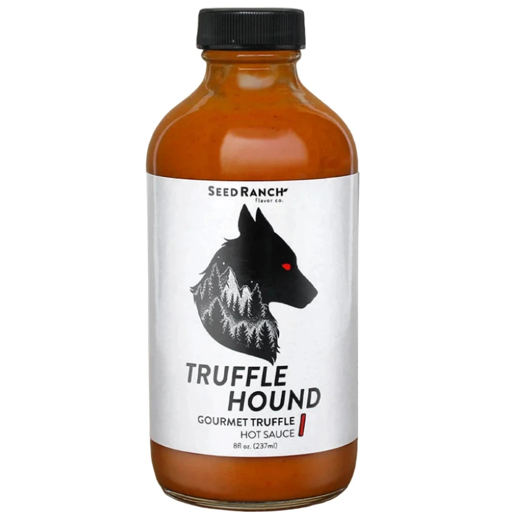 Bottle of Seed Ranch Truffle Hound Gourmet Truffle Hot Sauce on a white background