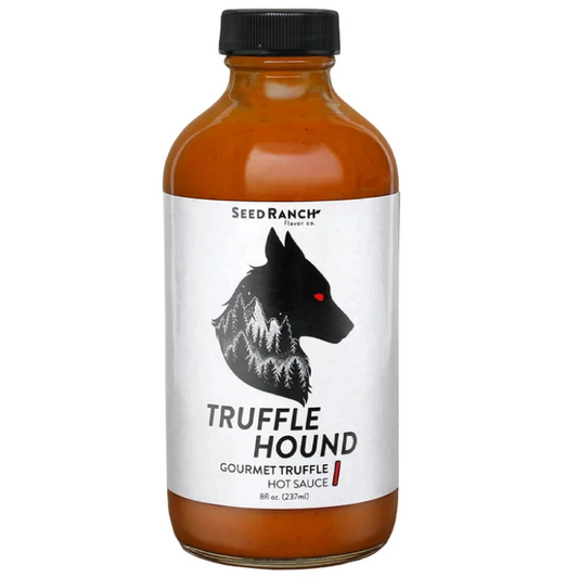 Bottle of Seed Ranch Truffle Hound Gourmet Truffle Hot Sauce on a white background
