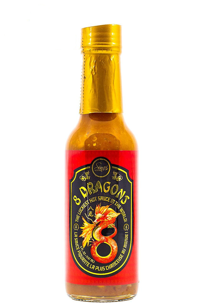 Hot sauce bottle with red label and gold cap on white background, '8 Dragon's' brand visible.