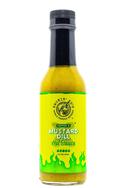 A bottle of Shakin' Tidd's Classic Mustard Dill Hot Sauce on a white background, featuring a yellow and green label with a black cap. A yellow 'WHOLESALE' logo is visible in the top-left corner.