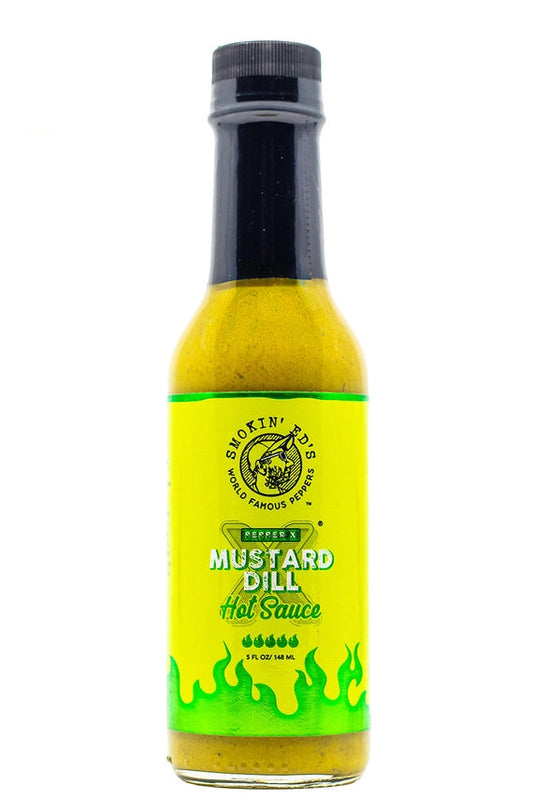A bottle of Shakin' Tidd's Classic Mustard Dill Hot Sauce on a white background, featuring a yellow and green label with a black cap. A yellow 'WHOLESALE' logo is visible in the top-left corner.