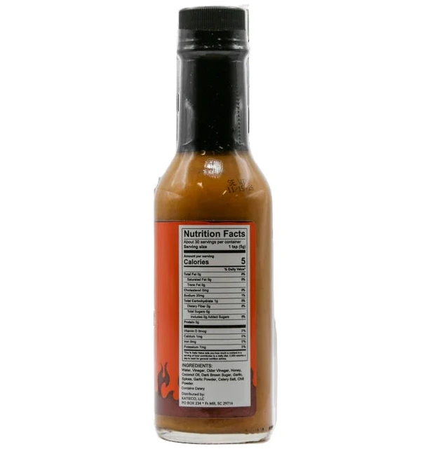 Bottle of Smokin Ed Wing Thing Pepper X hot sauce with nutrition facts label on a white background