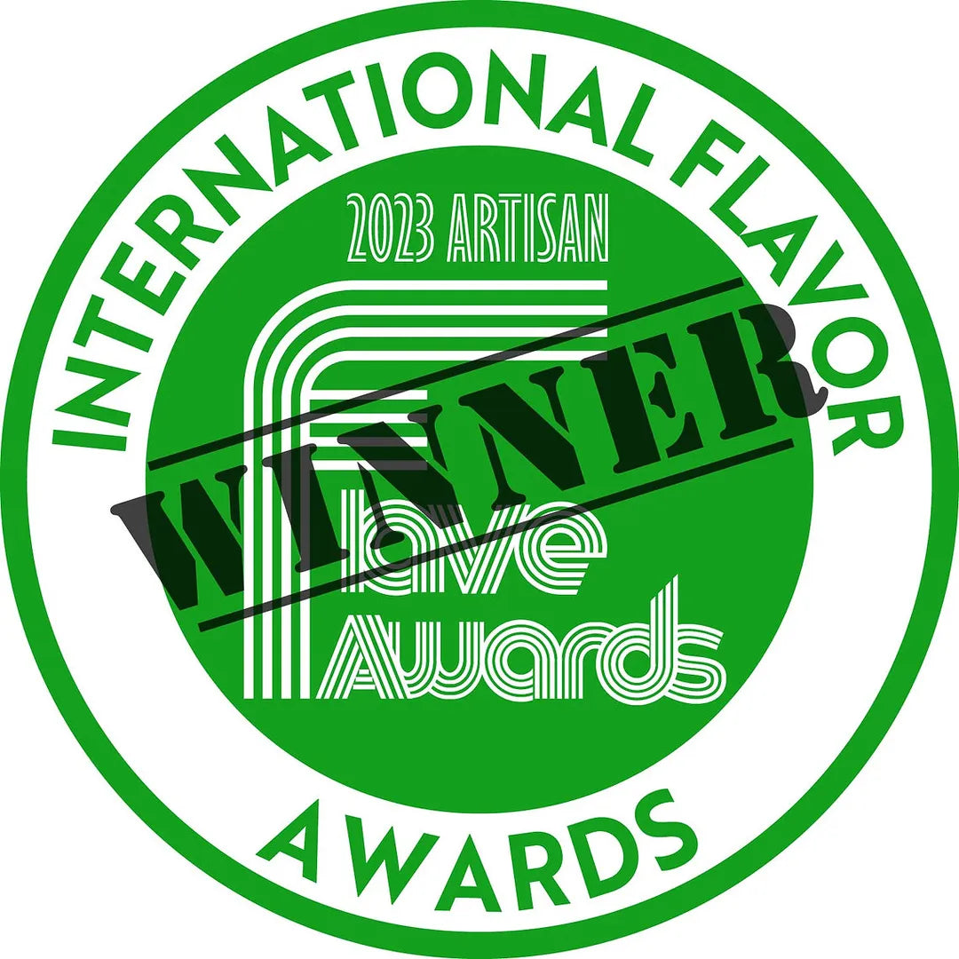 Green badge with '2023 Artisan International Flavor Awards Winner' text on a white background