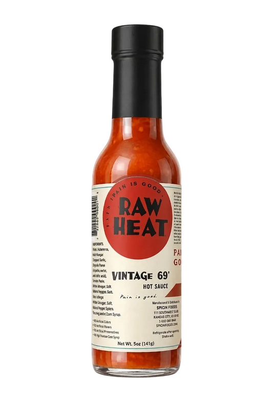 Bottle of Raw Heat hot sauce on a white background