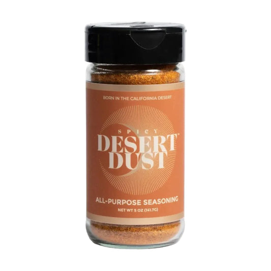 Jar of Spicy Desert Dust all-purpose seasoning on a white background