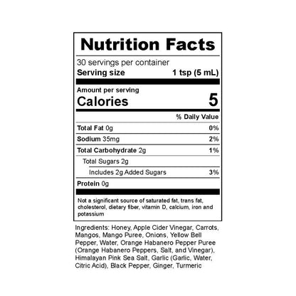 A Nutrition Facts label for a hot sauce product, showing serving size 1 tsp (5 mL), 5 calories per serving, and a list of ingredients including honey, apple cider vinegar, carrots, mango puree, onions, yellow bell pepper, water, orange habanero pepper puree, salt, vinegar, pink sea salt, garlic, ginger, and turmeric.