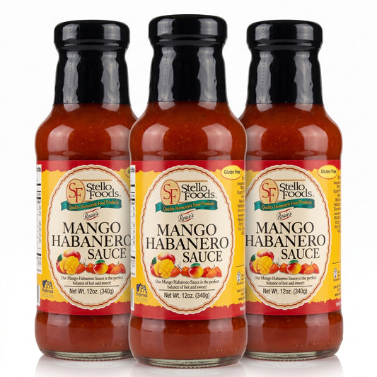 Three bottles of Stello Foods Mango Habanero Sauce arranged side by side on a white background.