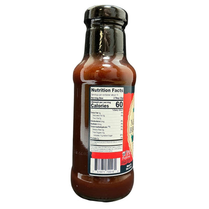 Bottle of sauce with nutrition label on a white background