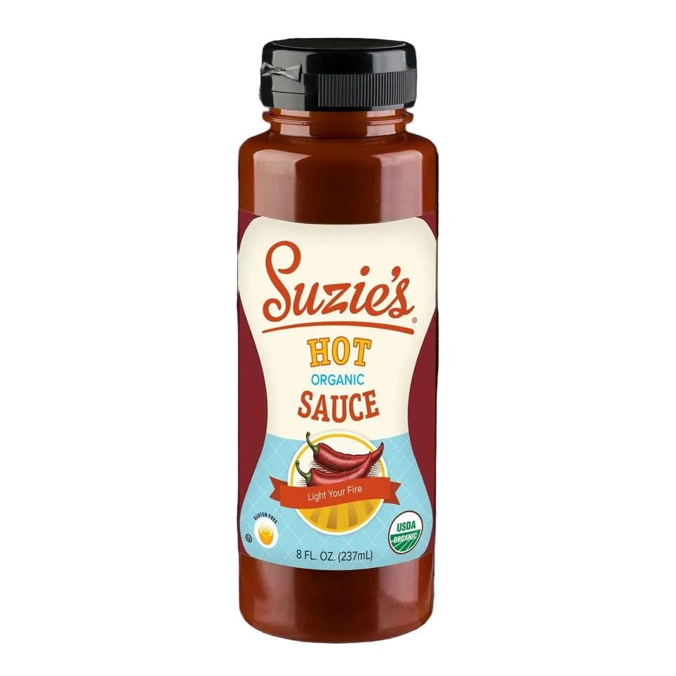 Bottle of Suzie's Hot Organic Sauce on a white background