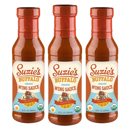 Three bottles of Suzie's Buffalo Organic Wing Sauce arranged side by side on a white background.