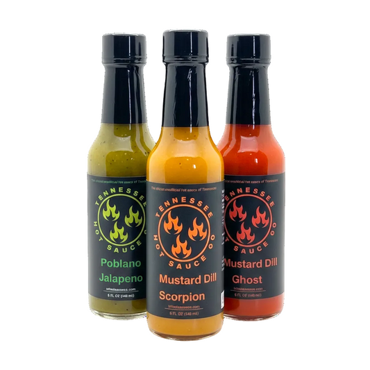 Three bottles of Tennessee Hot Sauce Co. sauces on a white background