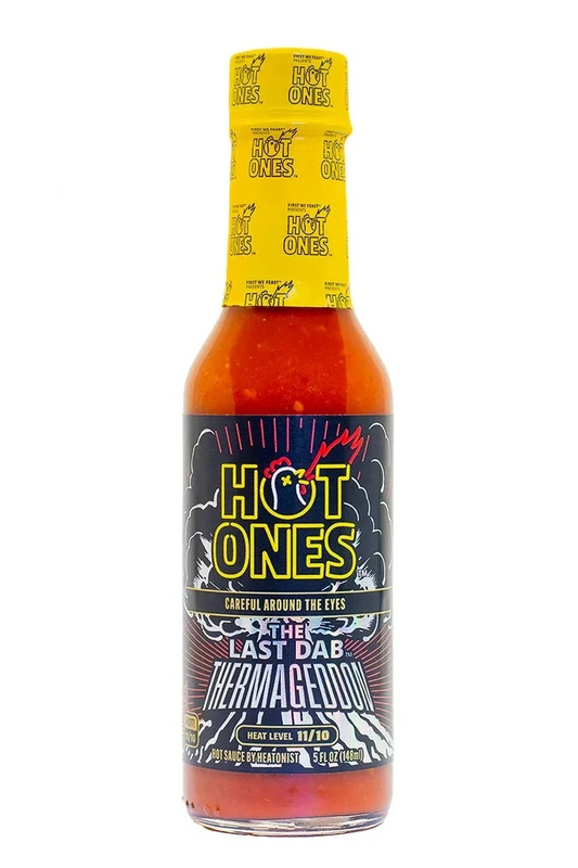 Hot Ones Last Dab Thermageddon hot sauce bottle with yellow cap on a white background