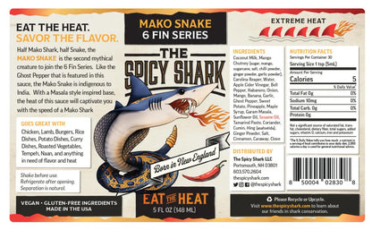 Spicy shark sauce packaging with snake illustration and branding details.