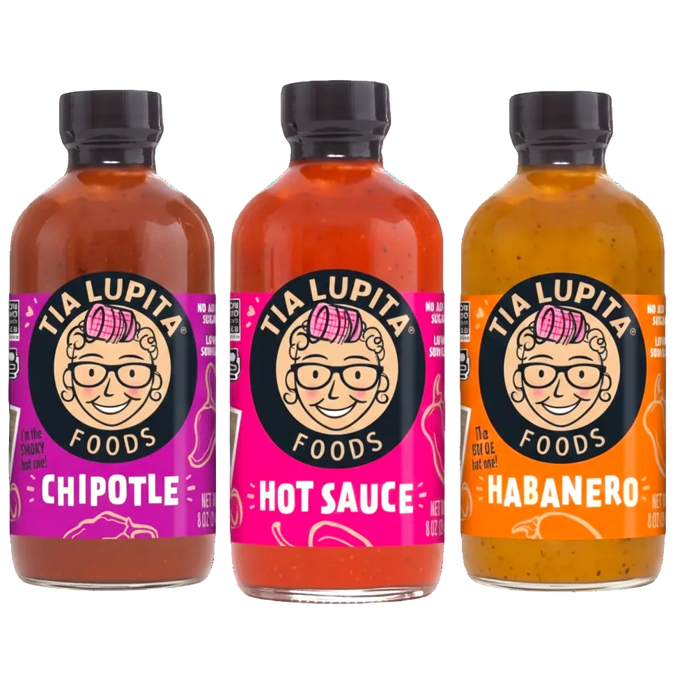 Three bottles of Tia Lupita Foods hot sauce on a white background