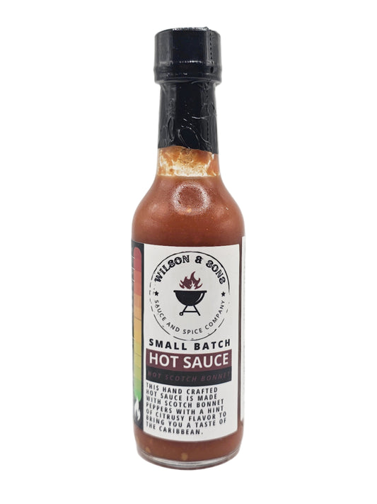 Bottle of Wilson & Son's Scotch Bonnet hot sauce on a white background