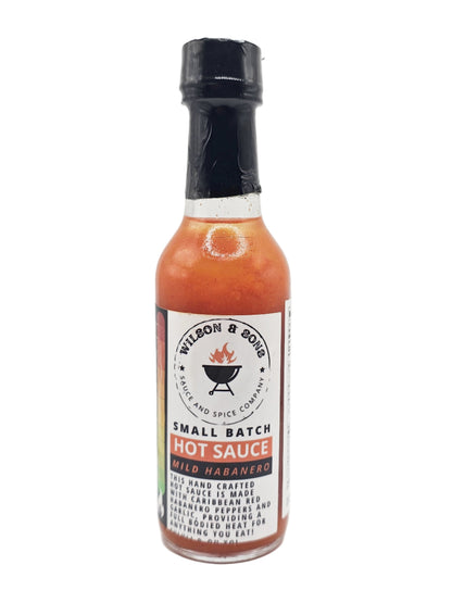 Bottle of Wilson & Sons Mild Habanero hot sauce on a white background