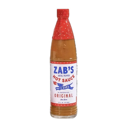 Bottle of Zab's Hot Sauce on a white background
