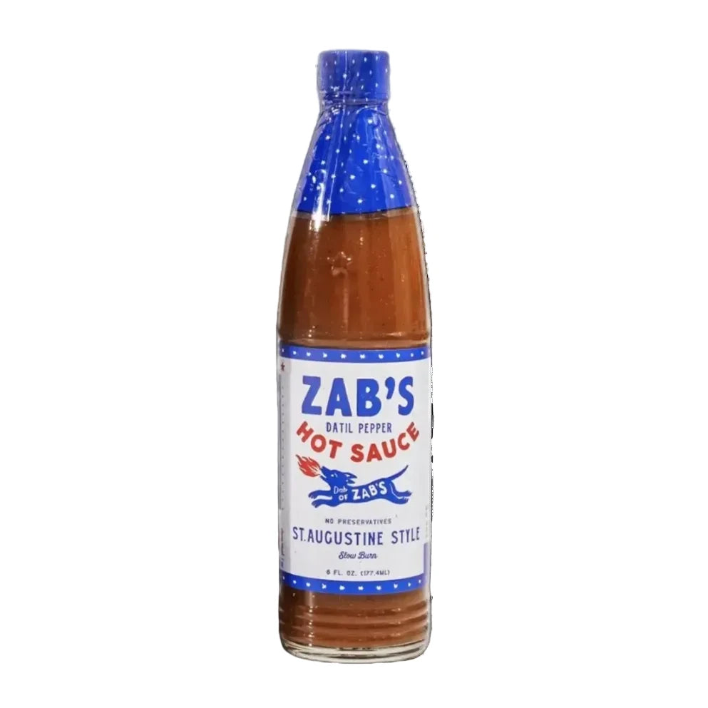 Bottle of Zab's hot sauce with blue cap on a white background