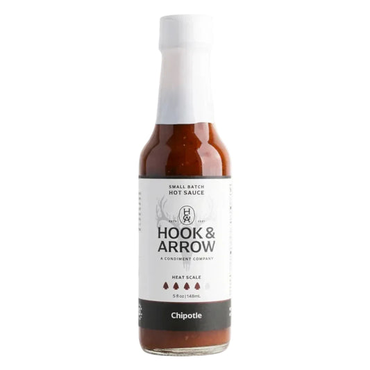 Bottle of Hook & Arrow Chipotle hot sauce on a white background