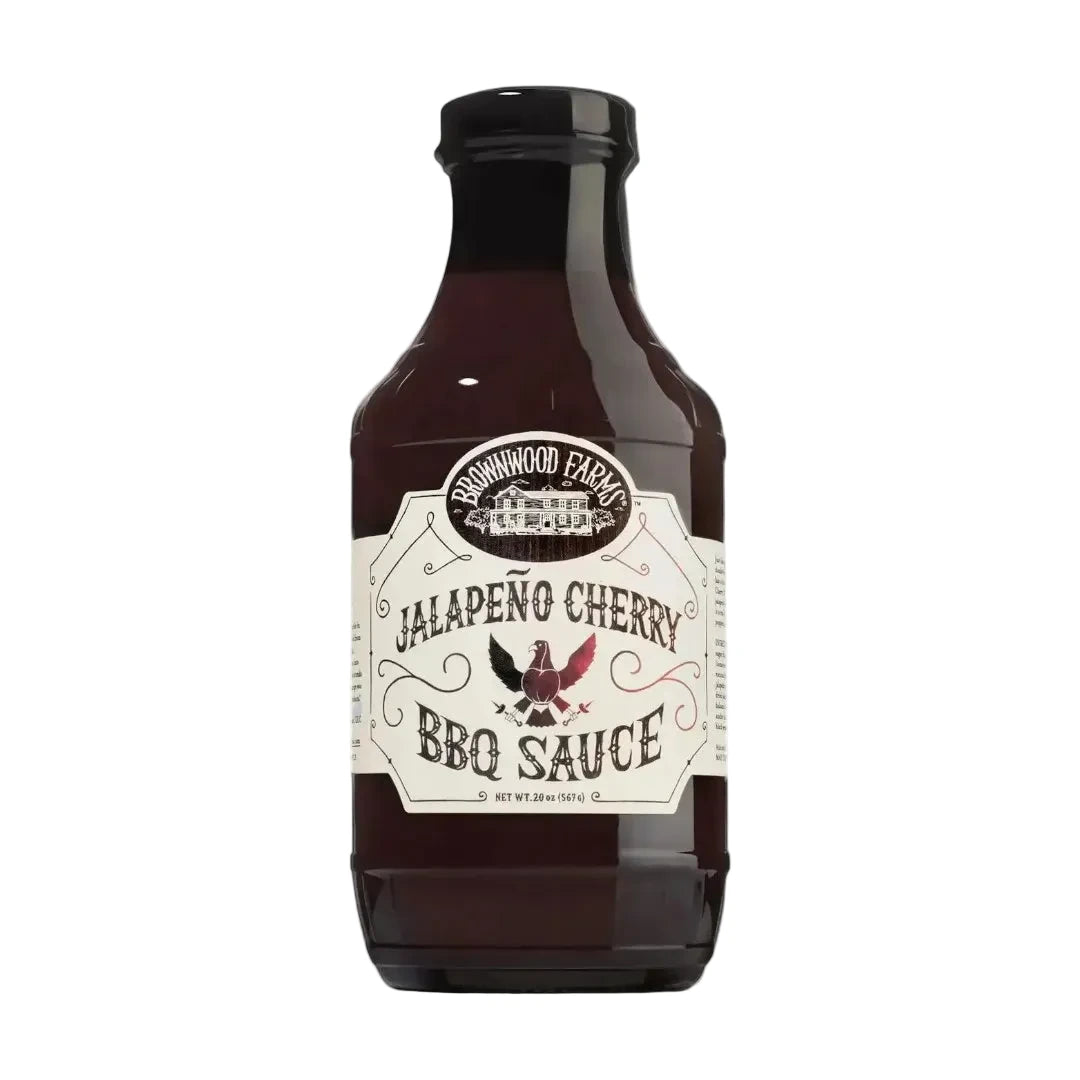 Bottle of Brownwood Farms Jalapeno Cherry BBQ Sauce on a white background