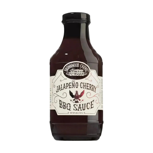 Bottle of Brownwood Farms Jalapeno Cherry BBQ Sauce on a white background