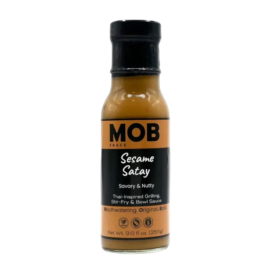 Bottle of MOB Sesame Satay sauce on a white background