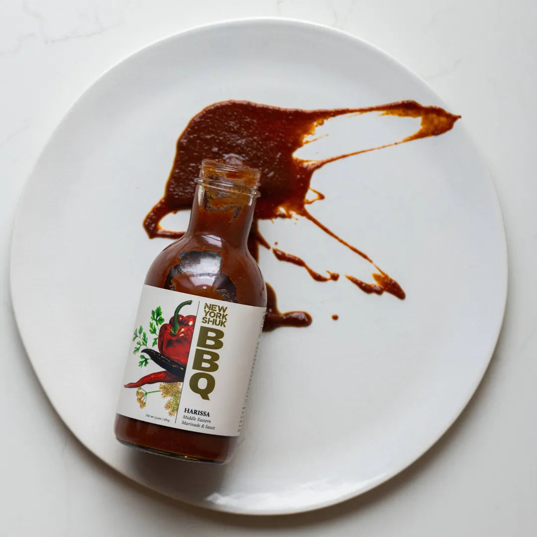 New York Shuk Harissa BBQ sauce splashed on a plate